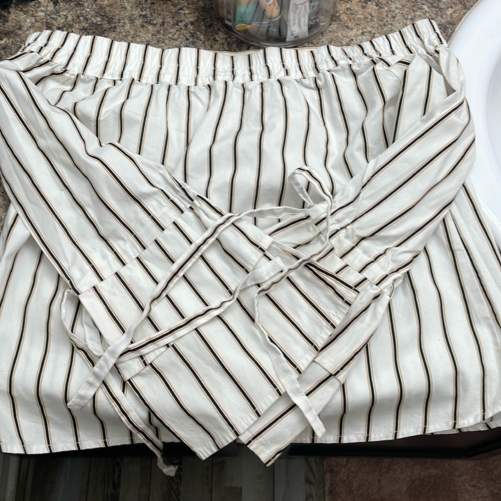 Look sexy and preppy at the same time in the stripped off the shoulder top.